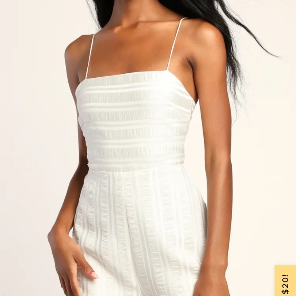 Lulus ivory romper size small.  New with tags - tried on once.
